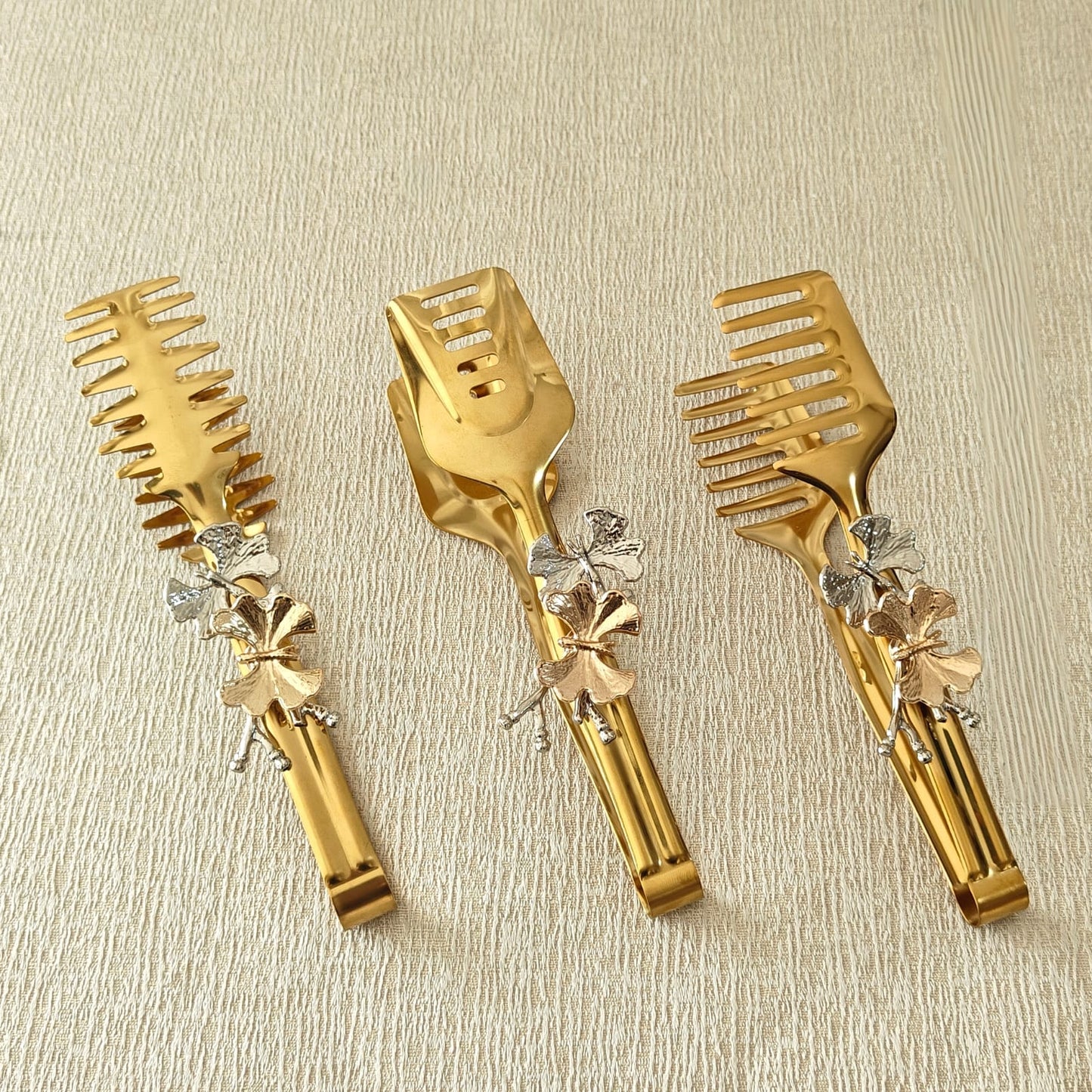 Tong in Gold