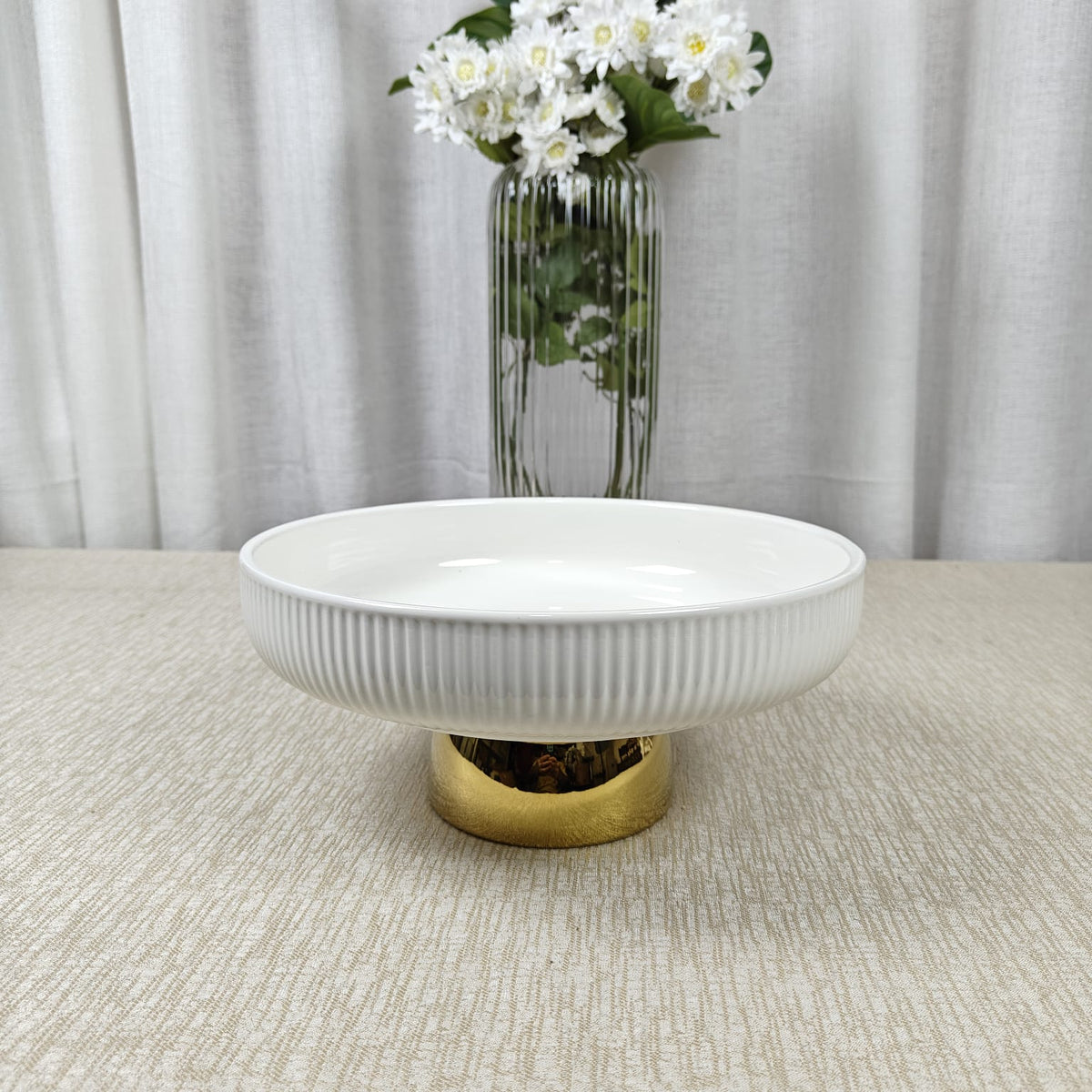 Fluted bowl with golden pedestal
