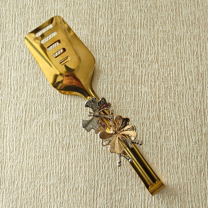 Tong in Gold