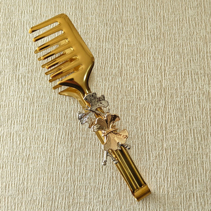 Tong in Gold