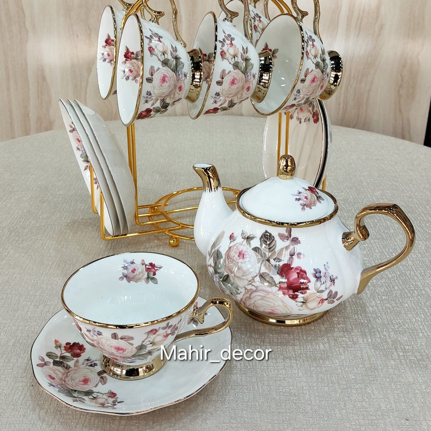 Cups and saucers set with teapot