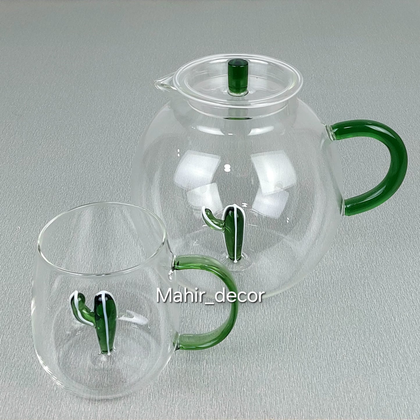 Glass cups and tea pot