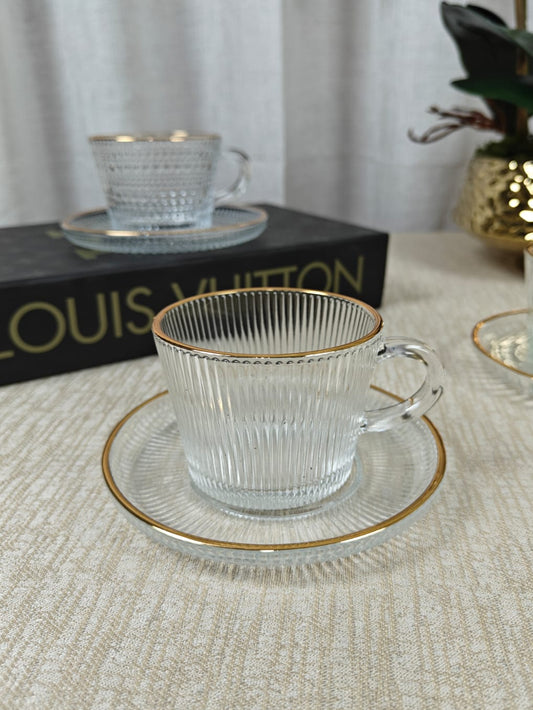 Ribbed glass tea cup and saucer set
