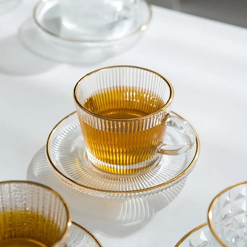 Ribbed glass tea cup and saucer set