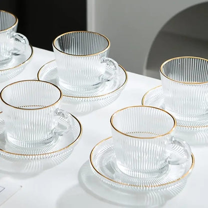 Ribbed glass tea cup and saucer set